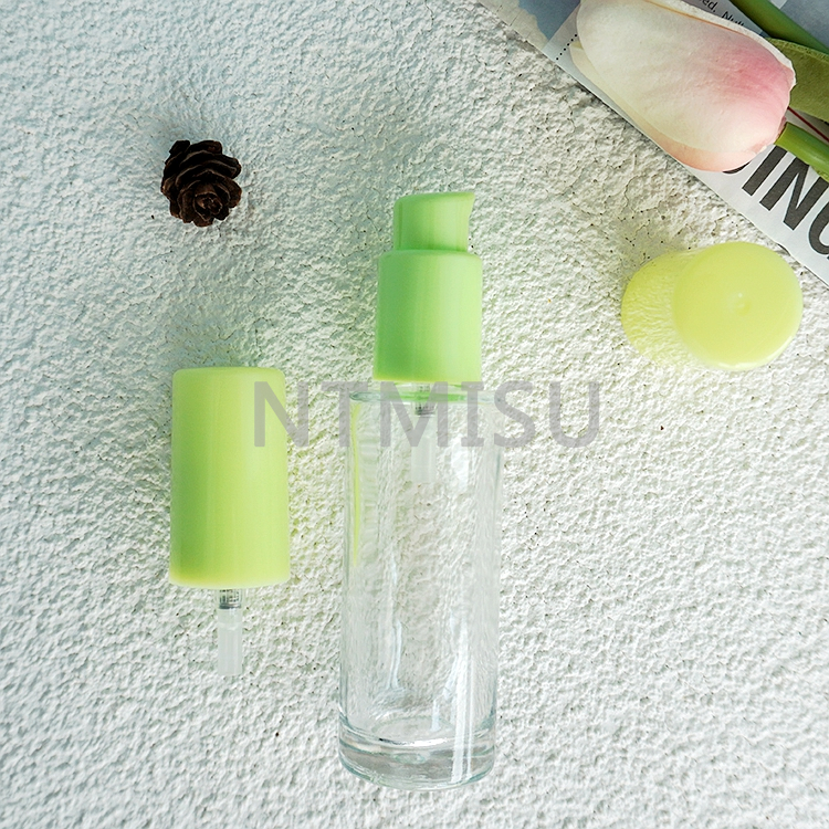 18 410 Plastic Green Cosmetic Treatment Pump Cream Pump for Bottles
