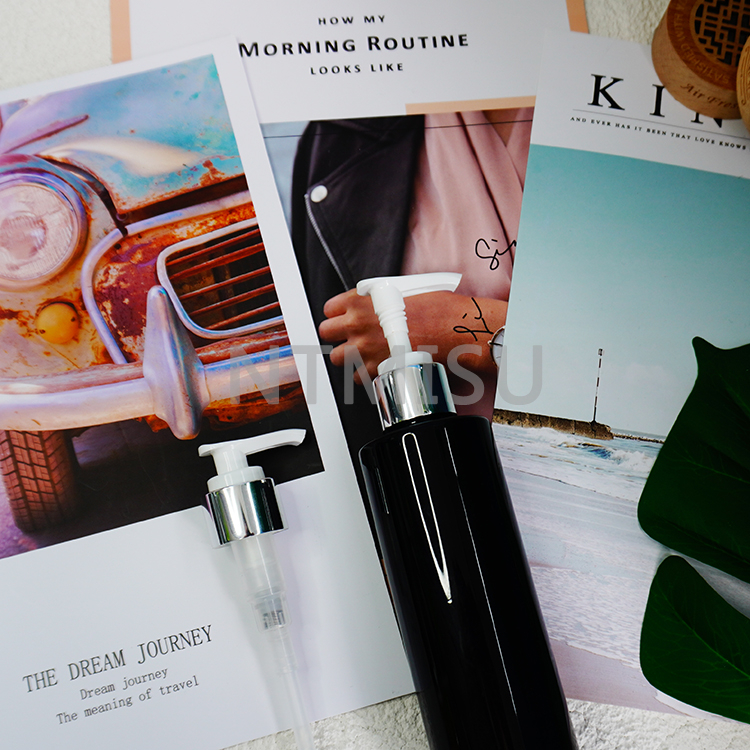 Wholesale White Streamline Up And Down Lotion Pump with Shiny Silver Closure