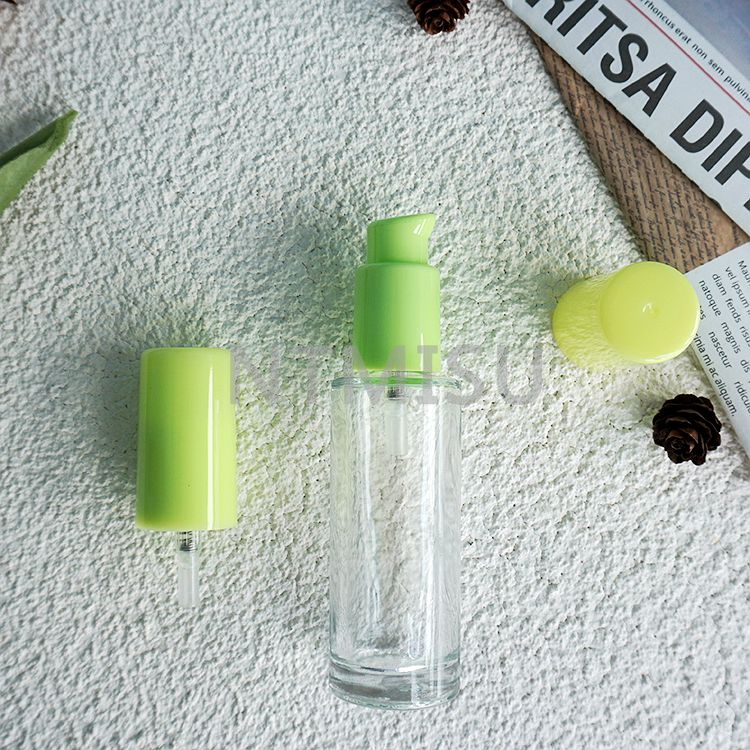 18 410 Plastic Green Cosmetic Treatment Pump Cream Pump for Bottles